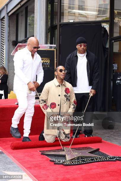 Vin Diesel, Ludacris, and LL Cool J attend a ceremony honoring Ludacris with a star on the Hollywood Walk of Fame on May 18, 2023 in Hollywood,...
