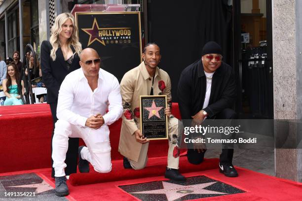 Vin Diesel, Ludacris, and LL Cool J attend a ceremony honoring Ludacris with a star on the Hollywood Walk of Fame on May 18, 2023 in Hollywood,...