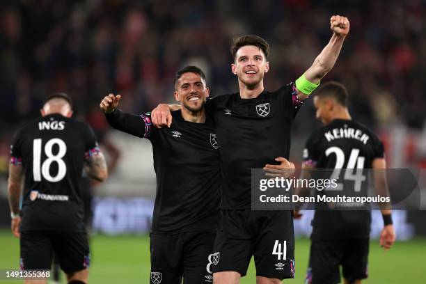 Declan Rice and Pablo Fornals of West Ham United celebrate victory after the UEFA Europa Conference League semi-final second leg match between AZ...