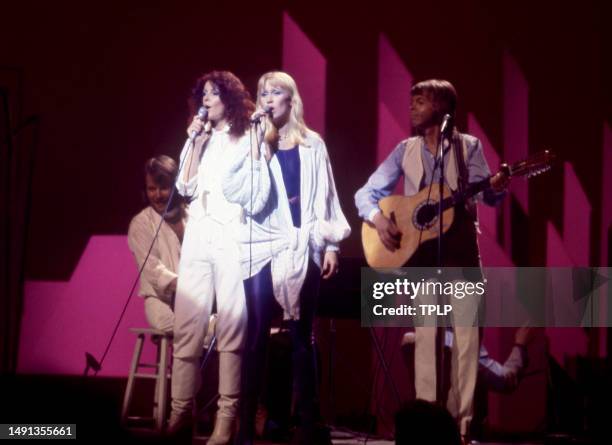 Swedish singers and songwriters Benny Andersson, Anni-Frid Lyngstad, Agnetha Fältskog and Björn Ulvaeus, of the supergroup ABBA, perform on stage...