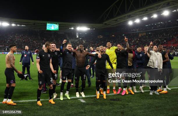 Players of West Ham United celebrate victory after the UEFA Europa Conference League semi-final second leg match between AZ Alkmaar and West Ham...