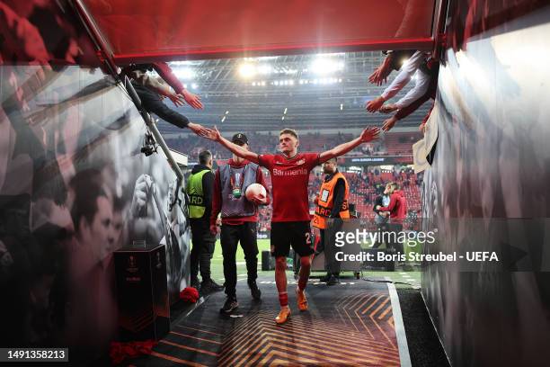 Florian Wirtz of Bayer 04 Leverkusen acknowledges the fans after the UEFA Europa League semi-final second leg match between Bayer 04 Leverkusen and...