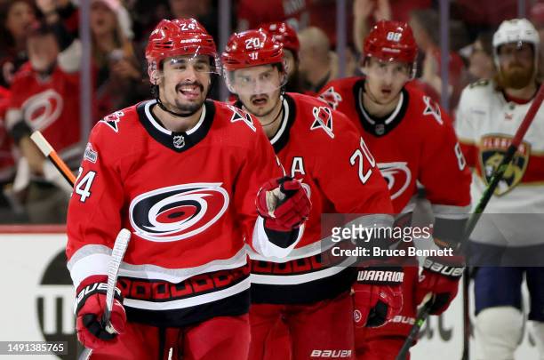 Seth Jarvis of the Carolina Hurricanes celebrates with his teammates after scoring a goal on Sergei Bobrovsky of the Florida Panthers during the...