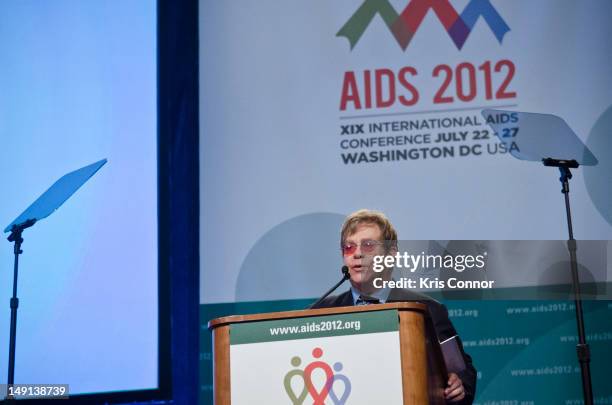 Sir Elton John speaks during a panel discussion at the 19th International AIDS Conference at The Walter E. Washington Convention Center on July 23,...