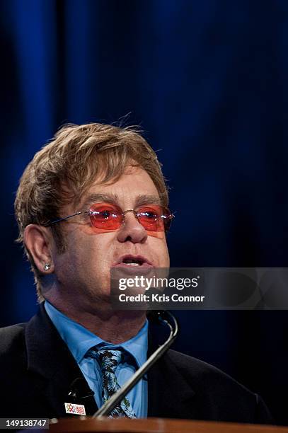 Sir Elton John speaks during a panel discussion at the 19th International AIDS Conference at The Walter E. Washington Convention Center on July 23,...