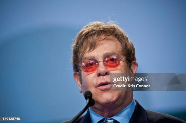 Sir Elton John speaks during a panel discussion at the 19th International AIDS Conference at The Walter E. Washington Convention Center on July 23,...