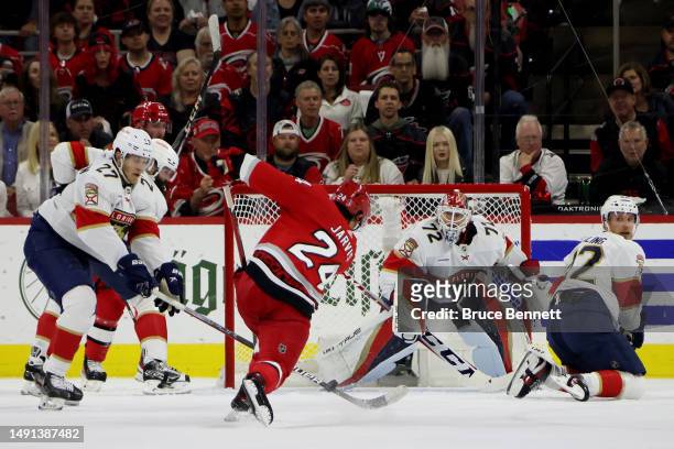 Seth Jarvis of the Carolina Hurricanes scores a goal on Sergei Bobrovsky of the Florida Panthers during the first period in Game One of the Eastern...