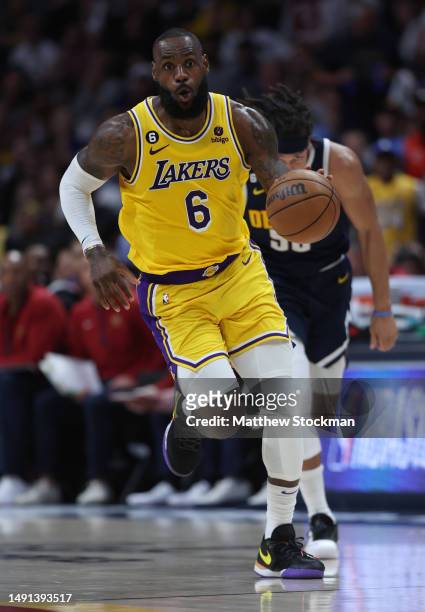 LeBron James of the Los Angeles Lakers dribbles during the second quarter against the Denver Nuggets in game two of the Western Conference Finals at...