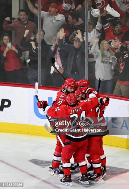 Stefan Noesen of the Carolina Hurricanes celebrates with his teammates after scoring a goal on Sergei Bobrovsky of the Florida Panthers during the...