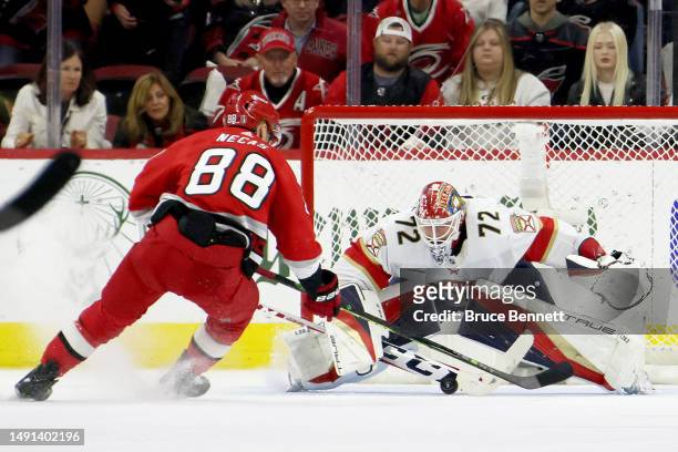 Martin Necas of the Carolina Hurricanes takes a shot on Sergei Bobrovsky of the Florida Panthers during the third period in Game One of the Eastern...