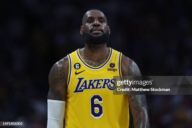 LeBron James of the Los Angeles Lakers reacts after losing to the Denver Nuggets in game two of the Western Conference Finals at Ball Arena on May...