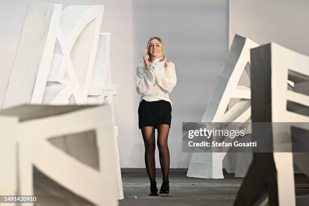 Designer Cameron Hill thanks the audience following the Cameron Hill show during the Next Gen runway show during Afterpay Australian Fashion Week...