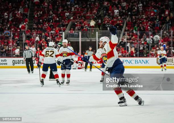 Matthew Tkachuk of the Florida Panthers celebrates with teammates after scoring the game-winning goal during the fourth overtime to defeat the...