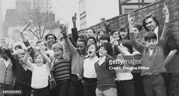 Rutherford Comprehensive School pupils wearing their ordinary clothes arrive at the school in Marylebone, London, England, 4th May 1972. The pupils...