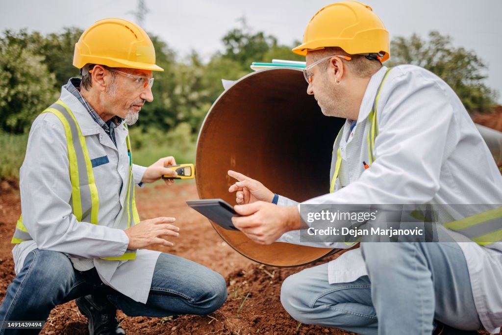 Engineers checking construction site
