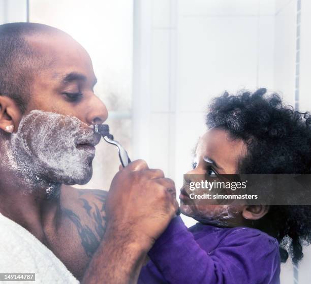 helping daddy shave - girl shaving stock pictures, royalty-free photos & images