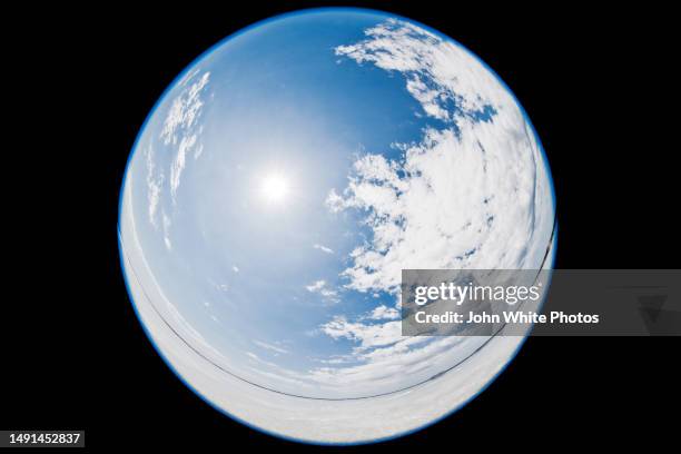fisheye lens photo of a salt lake and clouds in a blue sky. appears to be a blue planet. white salt lake. australia. - fish eye lens stock pictures, royalty-free photos & images
