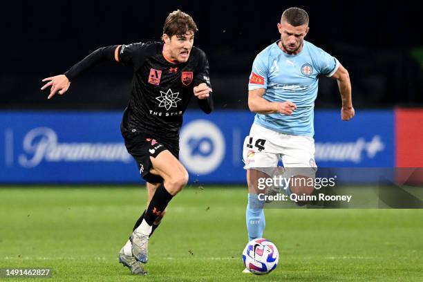 Max Burgess of Sydney FC and Valon Berisha of Melbourne City compete for the ball during the second leg of the A-League Men's Semi Final between...