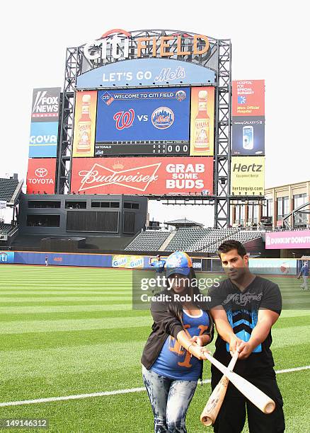 Nicole "Snooki" Polizzi and her fiance Jionni LaValle visit Citi Field on July 23, 2012 in the Queens borough of New York City.