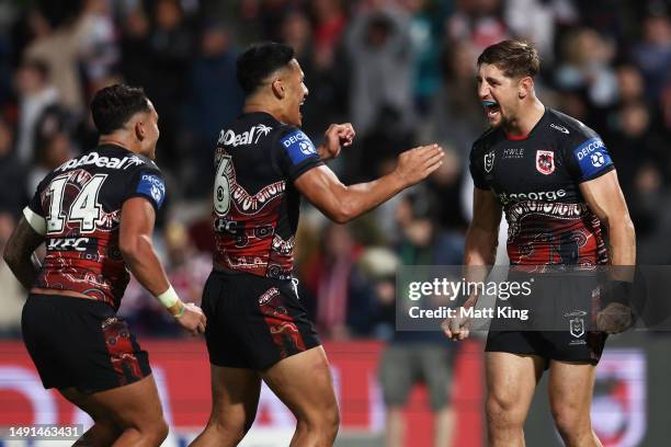 Zac Lomax of the Dragons celebrates victory with team mates at full time during the round 12 NRL match between St George Illawarra Dragons and Sydney...