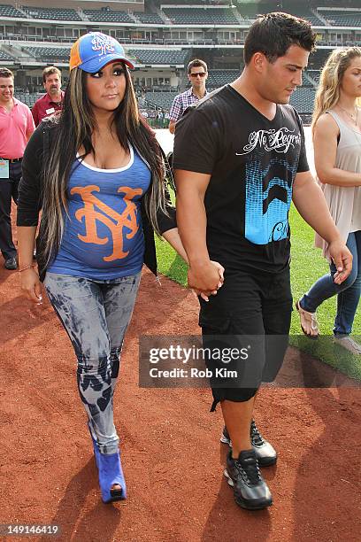 Nicole "Snooki" Polizzi and her fiance Jionni LaValle visit Citi Field on July 23, 2012 in the Queens borough of New York City.