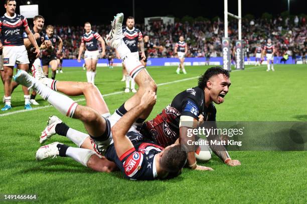 Jaydn Su'a of the Dragons celebrates scoring a try during the round 12 NRL match between St George Illawarra Dragons and Sydney Roosters at Netstrata...