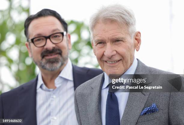 Director James Mangold and Harrison Ford attend the "Indiana Jones And The Dial Of Destiny" photocall at the 76th annual Cannes film festival at...