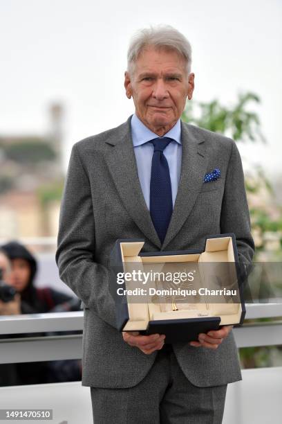 Harrison Ford attends the "Indiana Jones And The Dial Of Destiny" photocall at the 76th annual Cannes film festival at Palais des Festivals on May...