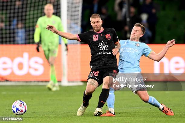 Luke Brattan of Sydney FC and Scott Jamieson of Melbourne City compete for the ball during the second leg of the A-League Men's Semi Final between...