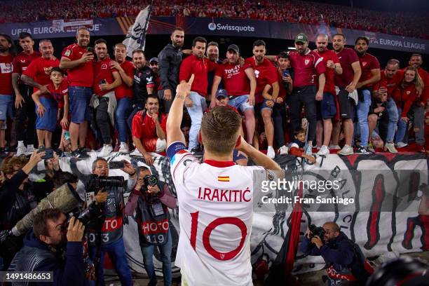 Ivan Rakitic of Sevilla FC celebrates witht the fans after winning the UEFA Europa League semi-final second leg match between Sevilla FC v Juventus...