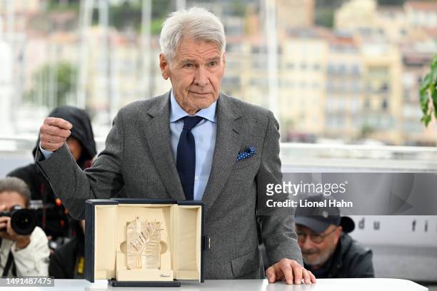 Harrison Ford attends the "Indiana Jones And The Dial Of Destiny" photocall at the 76th annual Cannes film festival at Palais des Festivals on May...
