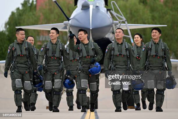 Pilots of the August 1st Air Demonstration Team react during a training session on May 6, 2023 in Tianjin, China. The August 1st Team, the People's...