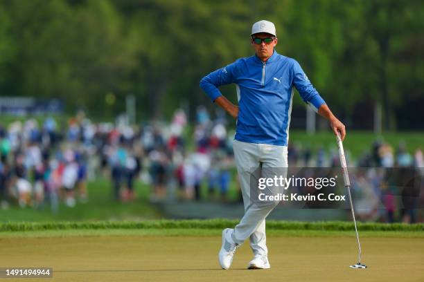 Rickie Fowler of the United States waits on the tenth green during the second round of the 2023 PGA Championship at Oak Hill Country Club on May 19,...