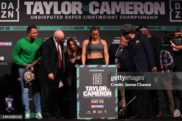 Cecilia Braekhus of Norway looks at the scales during their weigh in at The 3Arena Dublin on May 19, 2023 in Dublin, Ireland. The boxing match...