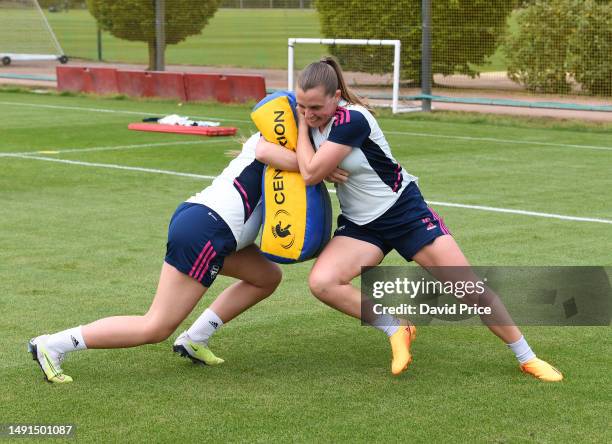 Noelle Maritz and Teyah Goldie of Arsenal during the Arsenal Women's training session at London Colney on May 19, 2023 in St Albans, England.
