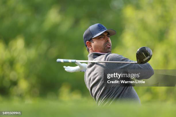 Anirban Lahiri of India drops his club on the fourth tee during the second round of the 2023 PGA Championship at Oak Hill Country Club on May 19,...