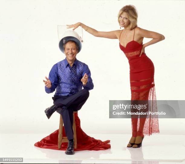 The singer, actress, television presenter and French model naturalized British Amanda Lear and the TV host Marco Balestri, pose for a photo shoot for...