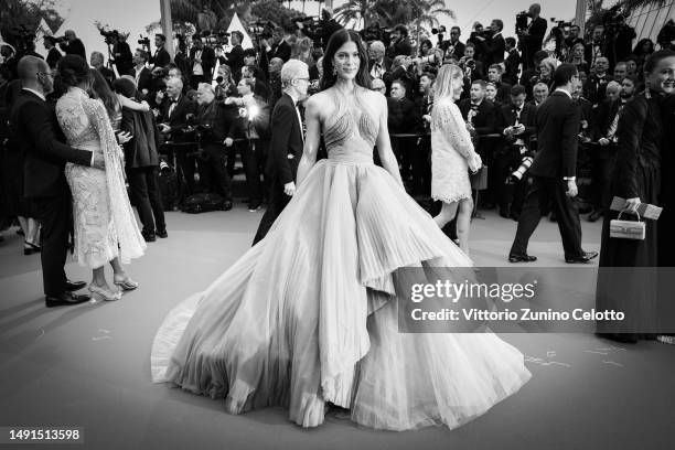 Iris Mittenaere attends the "Indiana Jones And The Dial Of Destiny" red carpet during the 76th annual Cannes film festival at Palais des Festivals on...