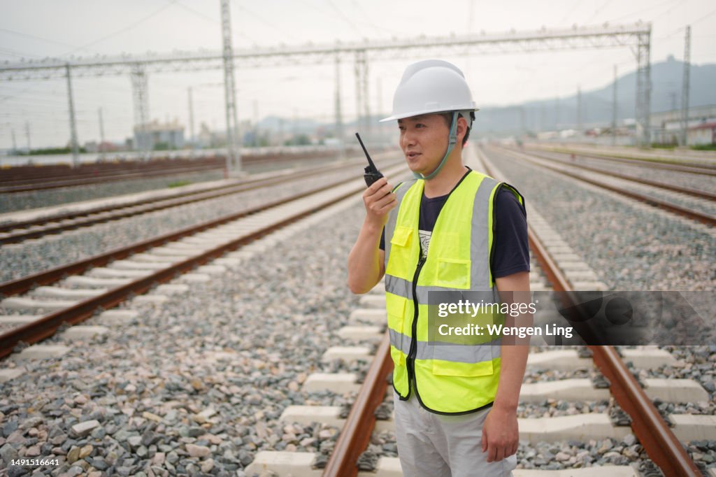 Asian railroad worker