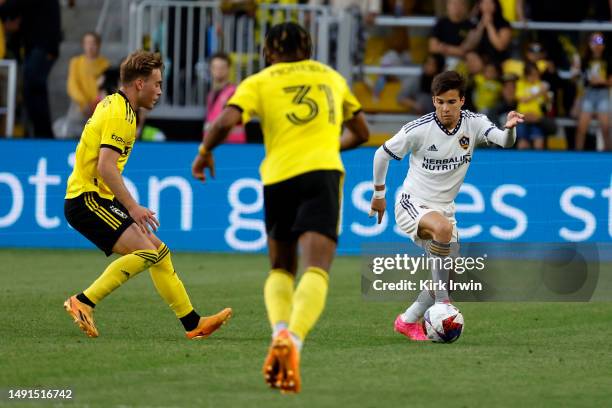 Riqui Puig of the LA Galaxy controls the ball during the match against the Columbus Crew at Lower.com Field on May 17, 2023 in Columbus, Ohio.