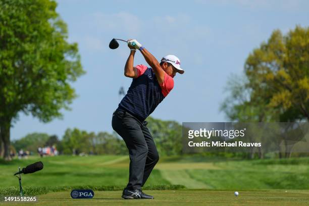 Hideki Matsuyama of Japan plays his shot from the 17th tee during the second round of the 2023 PGA Championship at Oak Hill Country Club on May 19,...