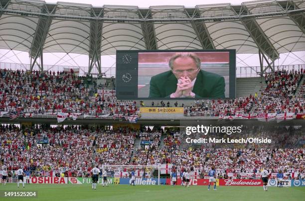 June 2002, Shizuoka - FIFA World Cup Quarter-final - England v Brazil - England manager Sven Goran Eriksson is projected on the giant screen at the...