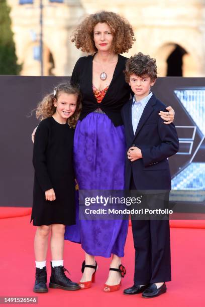 Italian film producer and director Ginevra Elkann and children on the red carpet at the world premiere of the film Fast X at the Colosseum. Rome ,...