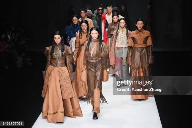 Models walk on the runway during the Inner Mongolia Normal University Show in the 2023 China Graduate Fashion Week at 751D.PARK on May 19, 2023 in...