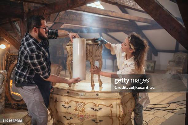 the owners of the antique store - antique-medical-tools stock pictures, royalty-free photos & images