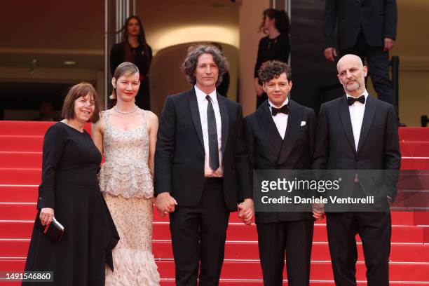 Producer Ewa Puszczynska, Sandra Hüller, Director Jonathan Glazer, Christian Friedel and Producer James Wilson attend the "The Zone Of Interest" red...