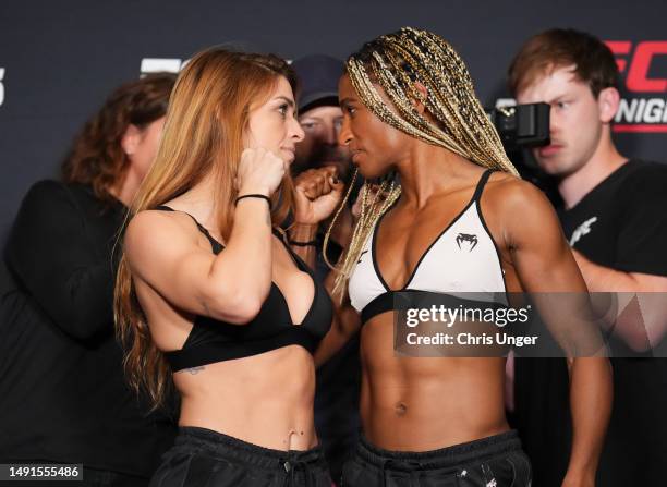 Opponents Mackenzie Dern and Angela Hill face off during the UFC weigh-in at Santa Fe Station Hotel and Casino on May 19, 2023 in Las Vegas, Nevada.