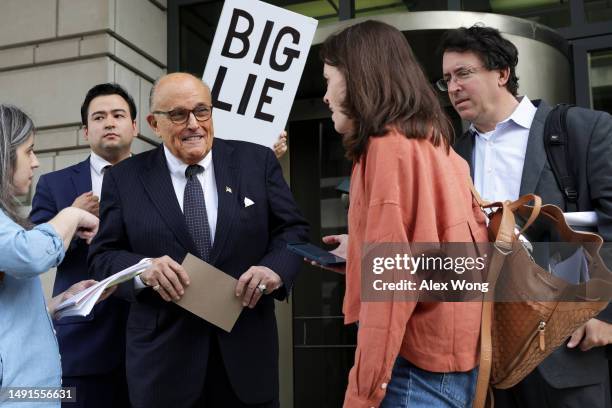 Former New York City Mayor and former personal lawyer for former President Donald Trump, Rudy Giuliani, talks to members of the press before he...