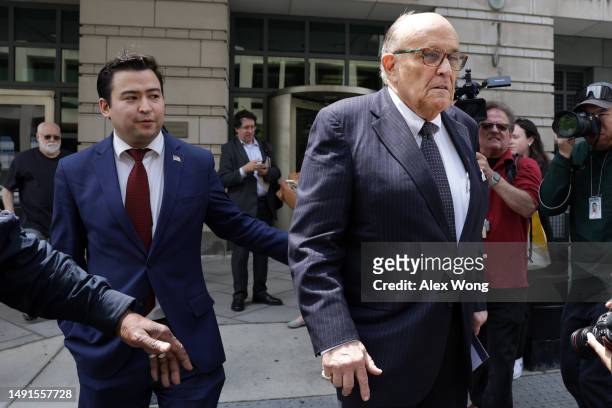 Former New York City Mayor and former personal lawyer for former President Donald Trump, Rudy Giuliani, leaves the U.S. District Court on May 19,...
