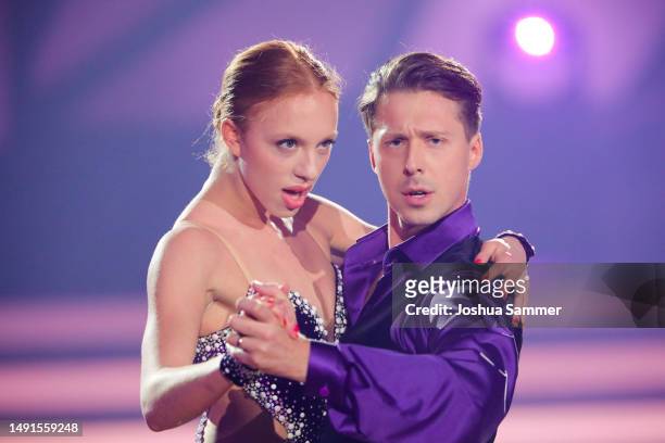Anna Ermakova and Valentin Lusin on stage during the finals of the 16th season of the television competition show "Let's Dance" at MMC Studios on May...